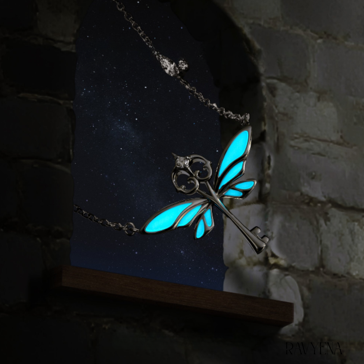 Celyssa Glow Winged Key Pendant Necklace