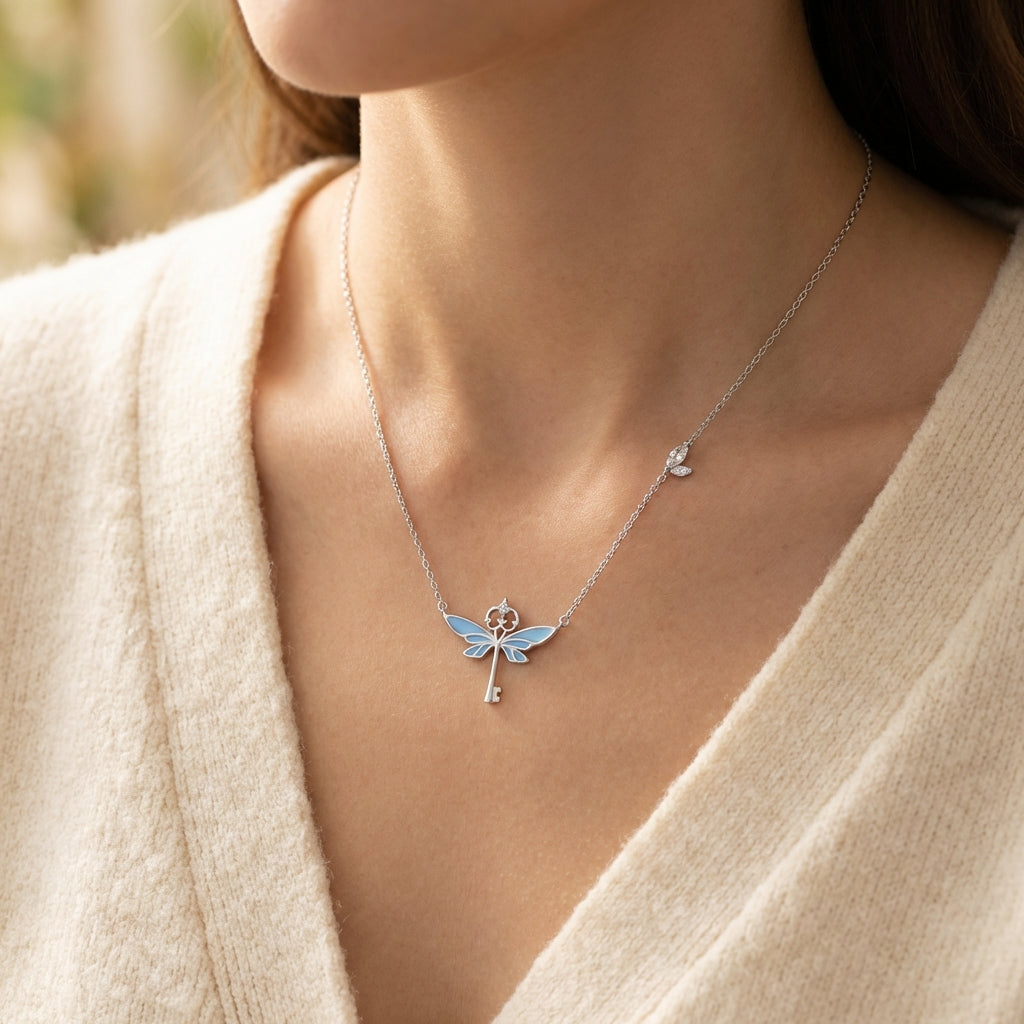 Celyssa Glow Winged Key Pendant Necklace