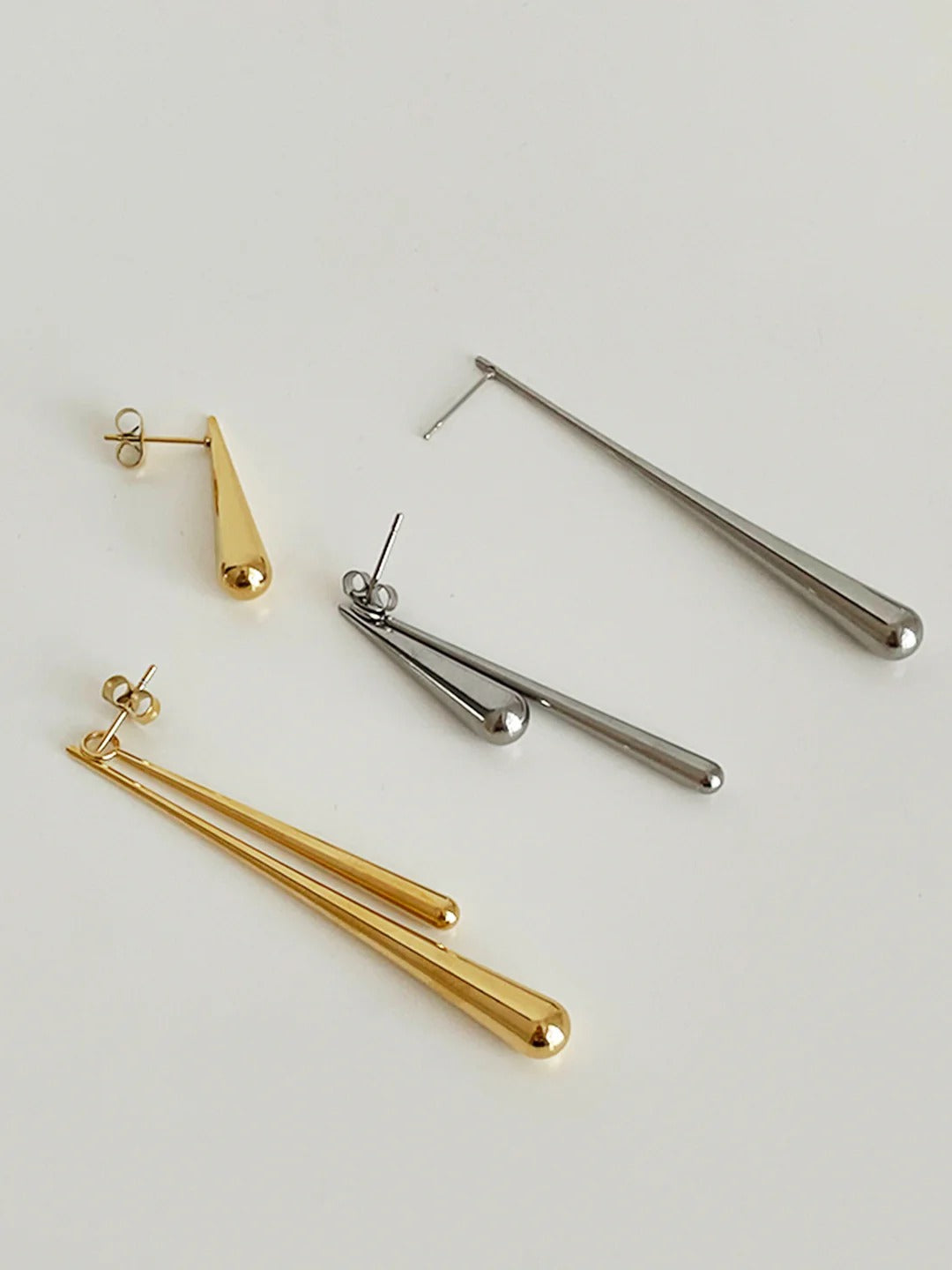 Celyssa Asymmetrical Elongated Drop Earrings in Gold