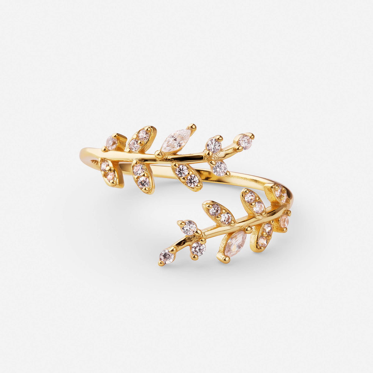 Gold adjustable leaf wrap ring with two leafy branches set with clear stones