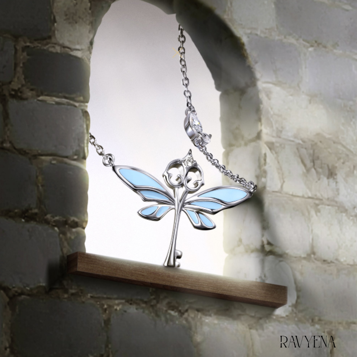 Celyssa Glow Winged Key Pendant Necklace