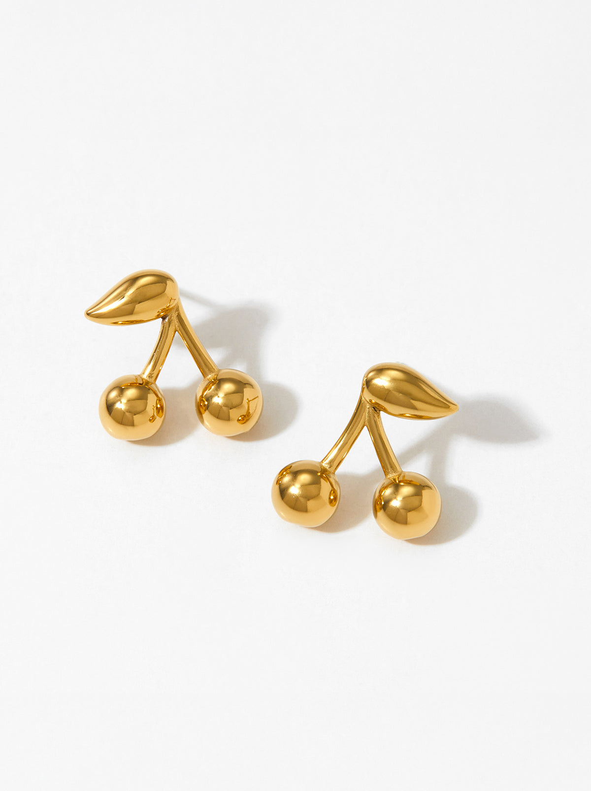 Celyssa Cherry Crystal Stud Earrings in Gold
