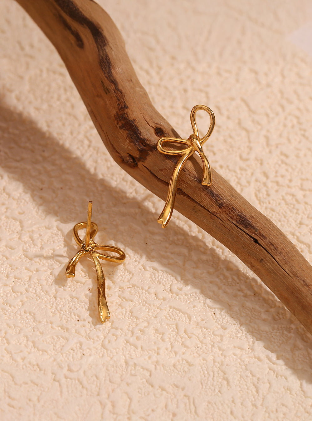 Celyssa Wandering Bow Stud Earrings