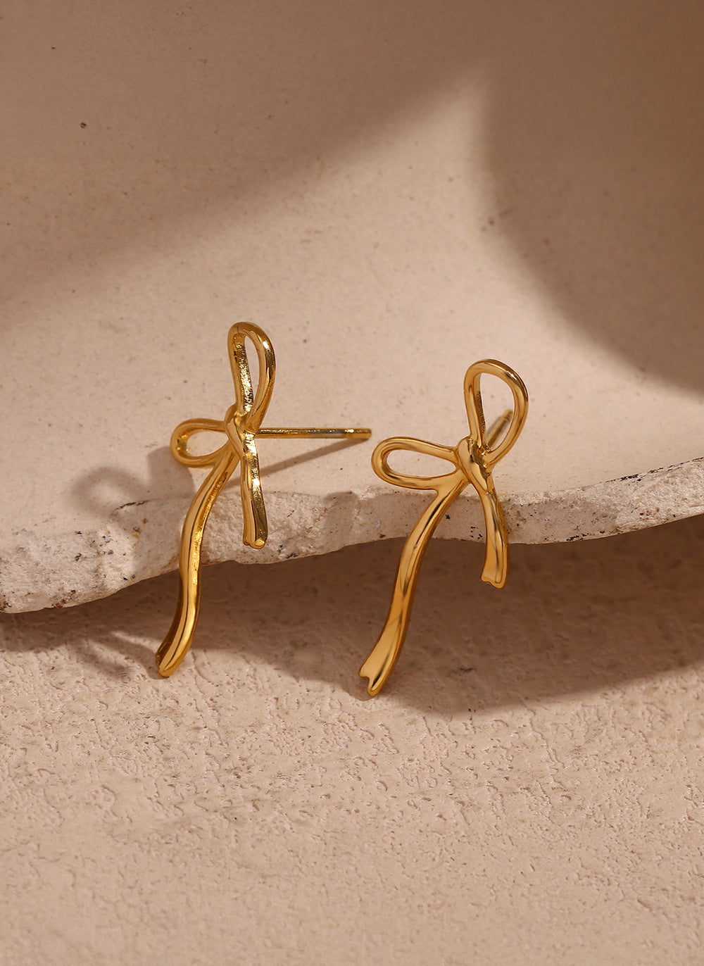 Celyssa Wandering Bow Stud Earrings